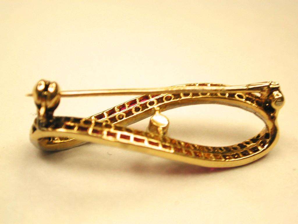 18 Carat Gold Ruby and Diamond Brooch Set with Centre Pearl, Dated circa 1920 In Good Condition For Sale In London, GB
