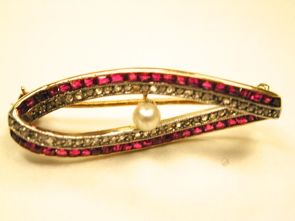 Women's 18 Carat Gold Ruby and Diamond Brooch Set with Centre Pearl, Dated circa 1920 For Sale
