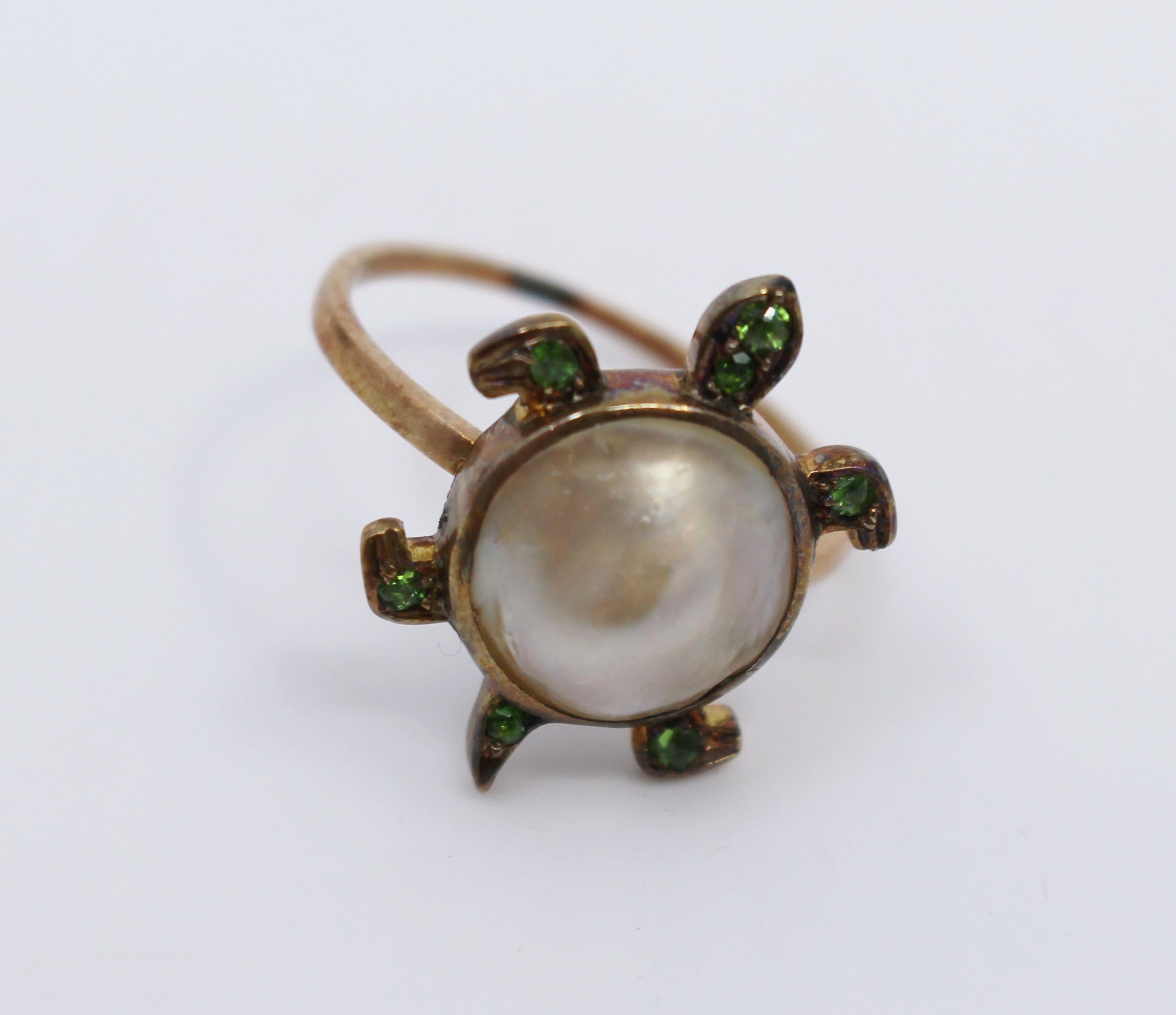 Period circa 1900
Composition 18-carat rose gold, pearl and demantoid garents
Weight 3.1 g
Ring size O 1/2 (British), 7.75 (US)
Condition: Good condition commensurate with age. Gold without hallmark, testing as 18-carat.
 

 

Very unusual