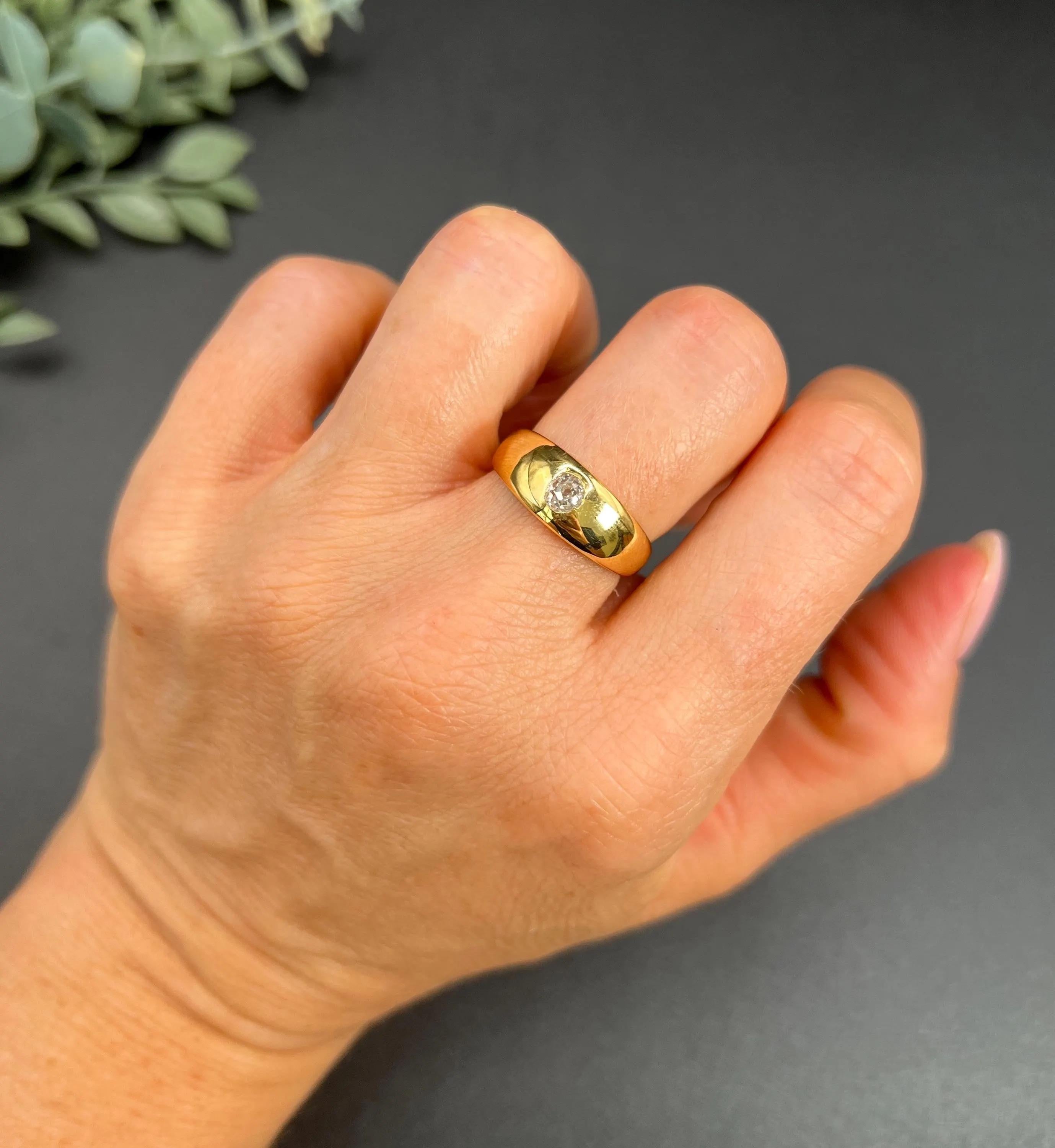 Antique Gypsy Band Ring 

18ct Gold 

Hallmarked Birmingham 1879

Makers Mark B & H 

This 18ct yellow gold ring is an exquisite piece of jewellery that is sure to capture your attention. It features a beautifully tapered, smooth gold band that is
