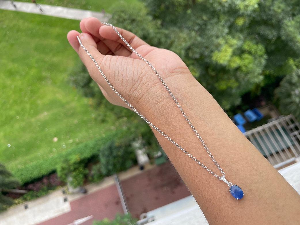 
Features:

Main Gemstone - Burmese Unheated Sapphire

Weight of gemstones (1pc) - 1.78 Ct

Measurements of gemstones - 8.1x6.1mm (approx)

Weight of diamonds (5 pcs) - 0.05 Ct

Cut - Oval

Color - Blue

Clarity - VS (It has a slight blemish near