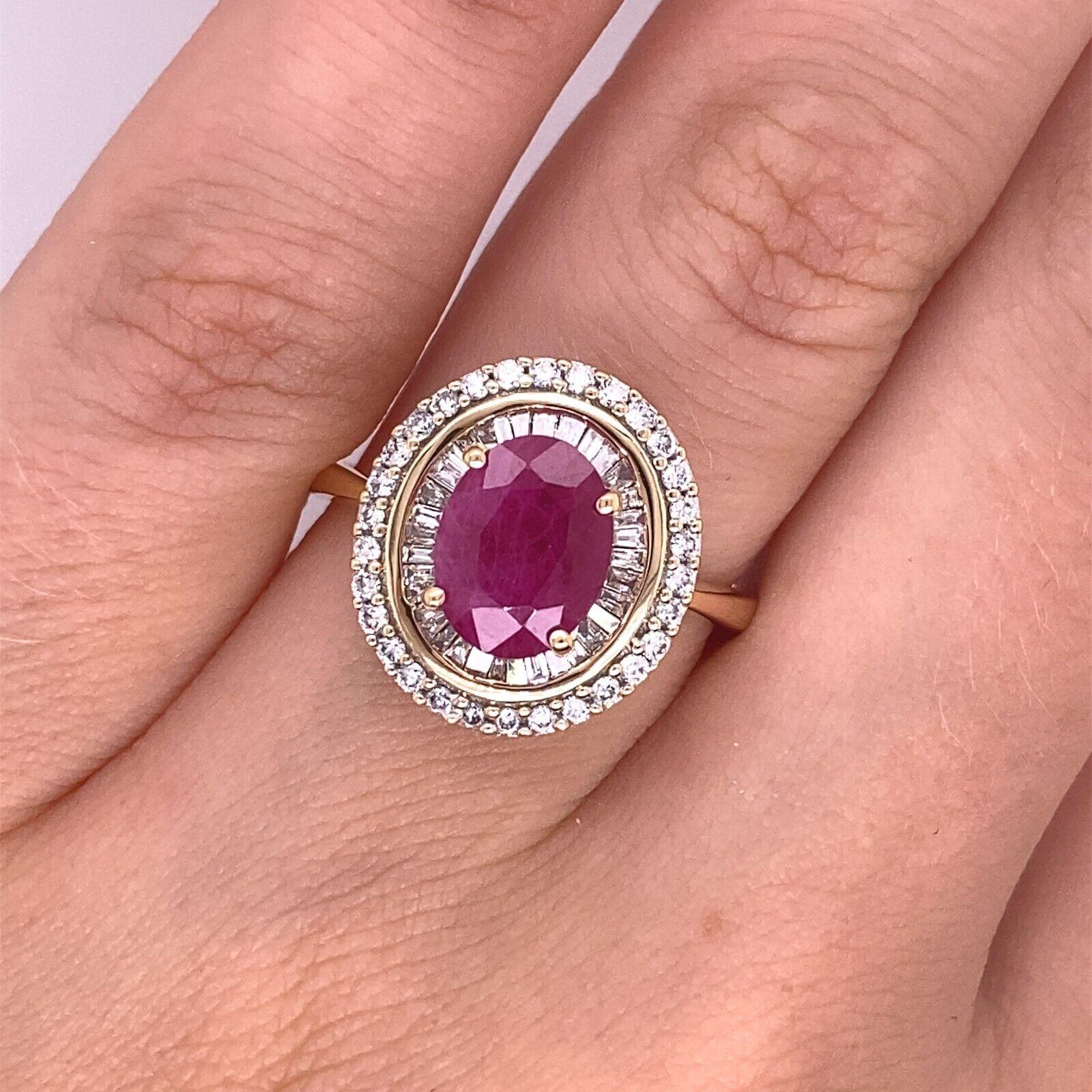 18ct Oval 1.50ct Ruby Ring Surrounded by 1 Row of Baguettes + Round Diamonds In Excellent Condition For Sale In London, GB