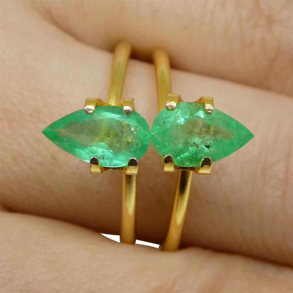 
Description:

Gem Type: Emerald
Number of Stones: 2
Weight: 1.8 cts (0.90ct and 0.90ct)
Measurements: 8.86 x 5.56 x 3.61 mm and 9.37 x 5.29 x 3.32 mm
Shape: Pear
Cutting Style Crown: Brilliant Cut
Cutting Style Pavilion: Modified Brilliant