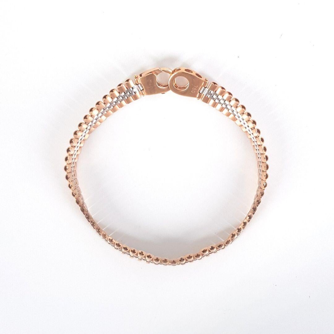 Exquisit
Artikel-Attribute
Metall:                     18ct Rose und Weißgold
Länge:                            202mm
Breite:                              8mm 
Höhe:                             2mm
Bruttogewicht:           22,2 Gramm

