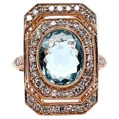18CT Rose Gold Aquamarine and Diamond Ring