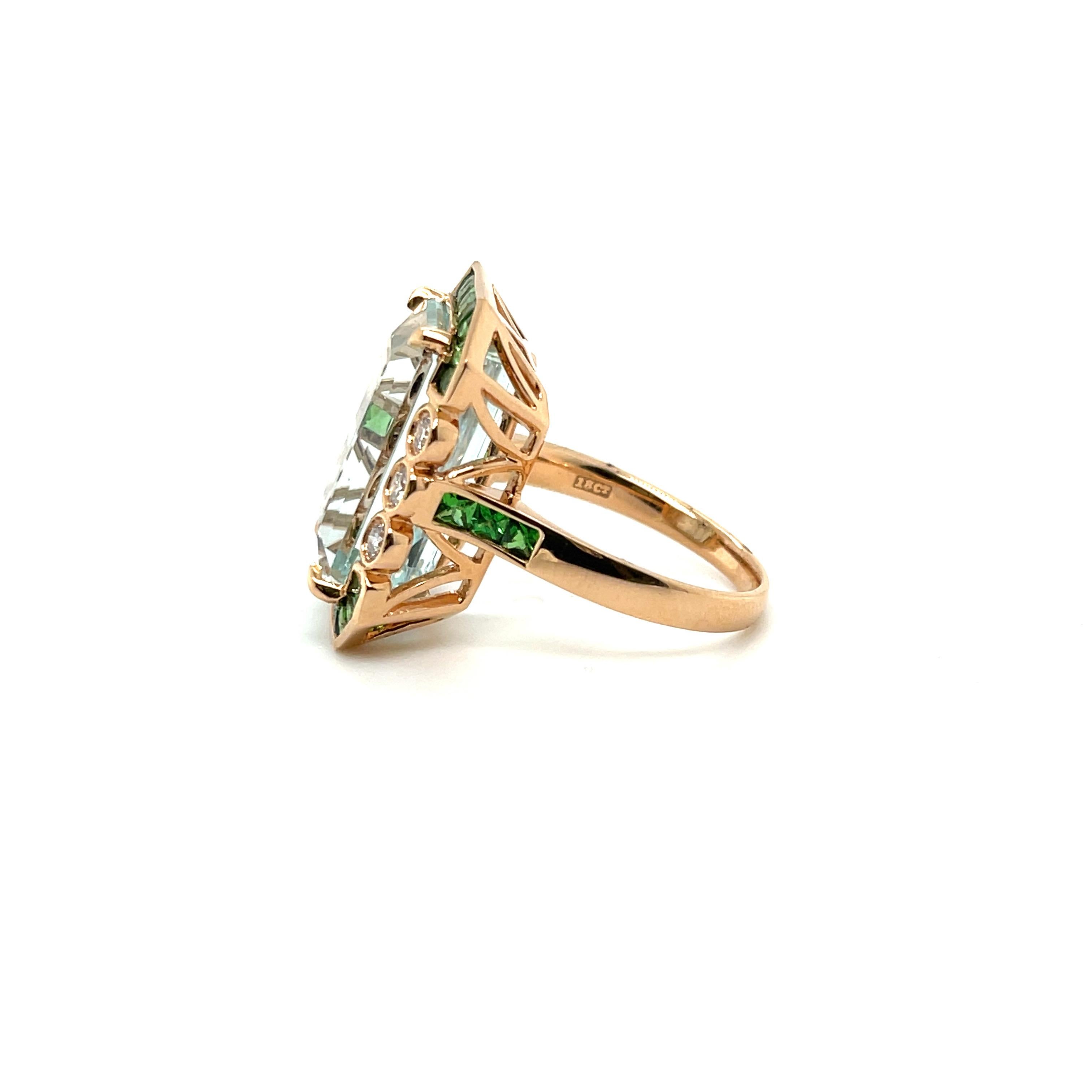 Heirloom Aquamarine, Tsavorite Garnet and Diamond ring, gorgeously crafted in eighteen karat rose gold, complimented by a stunning polished finish design. 


Item: One stamped 18CT rose gold Aquamarine, Garnet and diamond cocktail ring