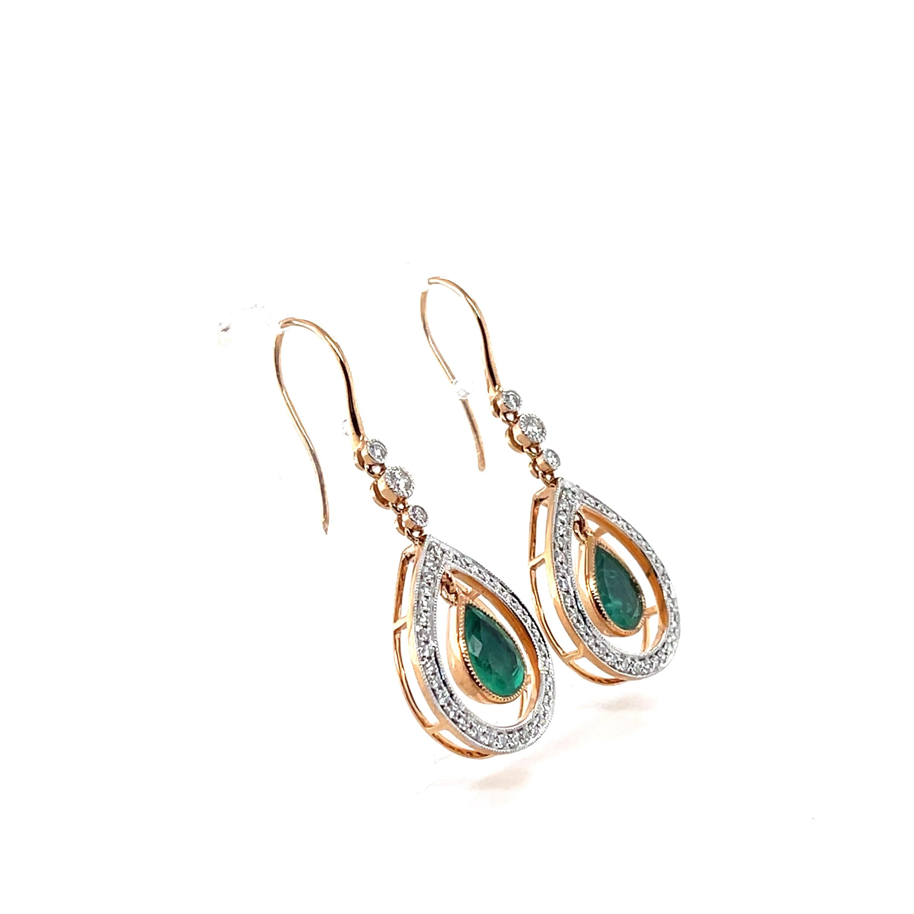 A set of Pear cut emerald and round brilliant cut diamond earrings crafted into a Sheppard's hooks designed earring pair.

Emerald Weight : 2.18ct
Emerald Colour/Grade: 