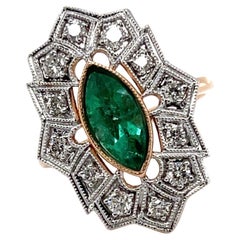18 Karat Roségold kolumbianischer Marquise-Smaragd und Diamantring