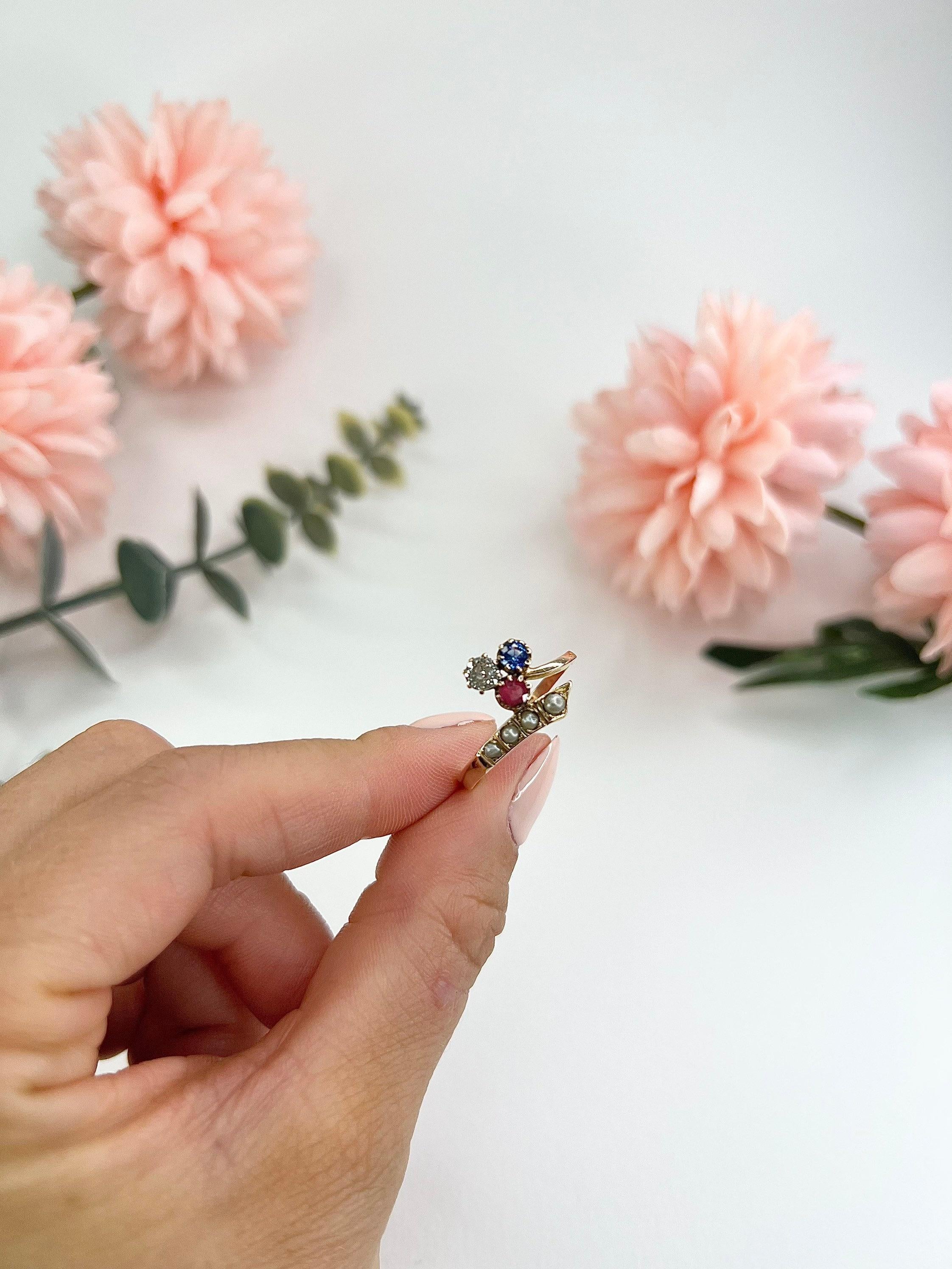 18ct Rose Gold Edwardian Clover Crossover Ruby Diamond Sapphire Seed Pearl Ring In Good Condition For Sale In Brighton, GB