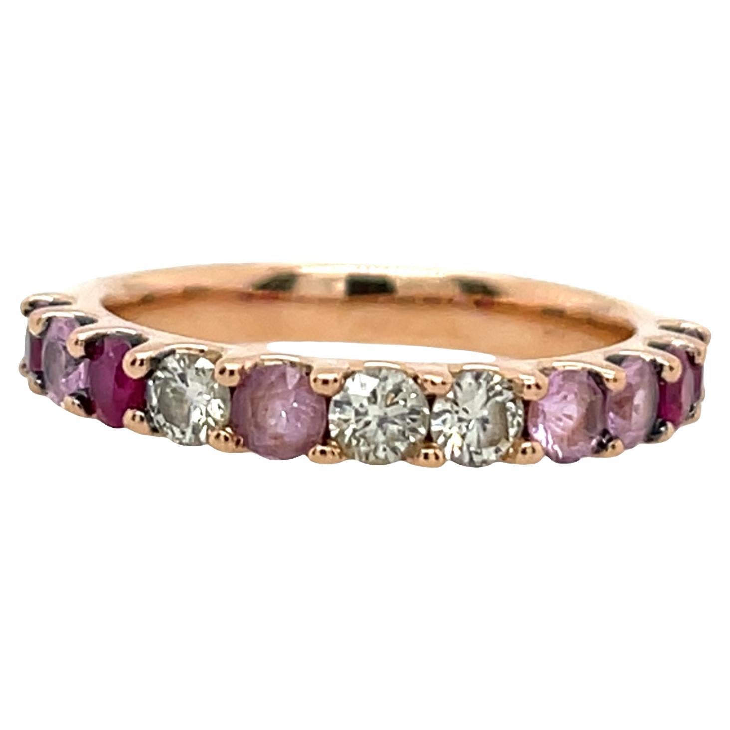 Bague d'éternité en or rose 18ct sertie de rubis, de saphirs roses et de diamants en vente