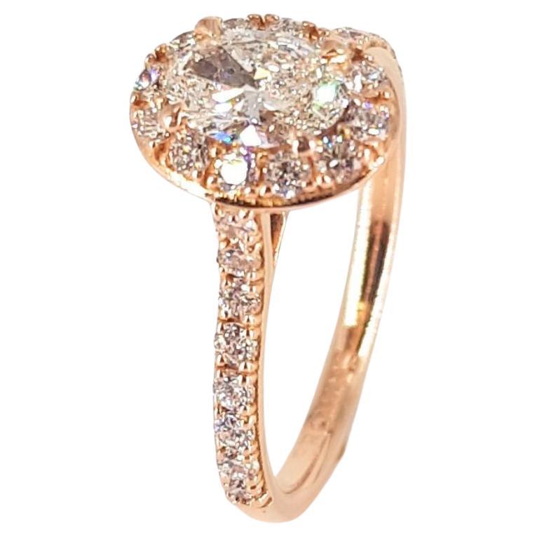 Bague en or rose 18 carats avec diamant ovale en vente