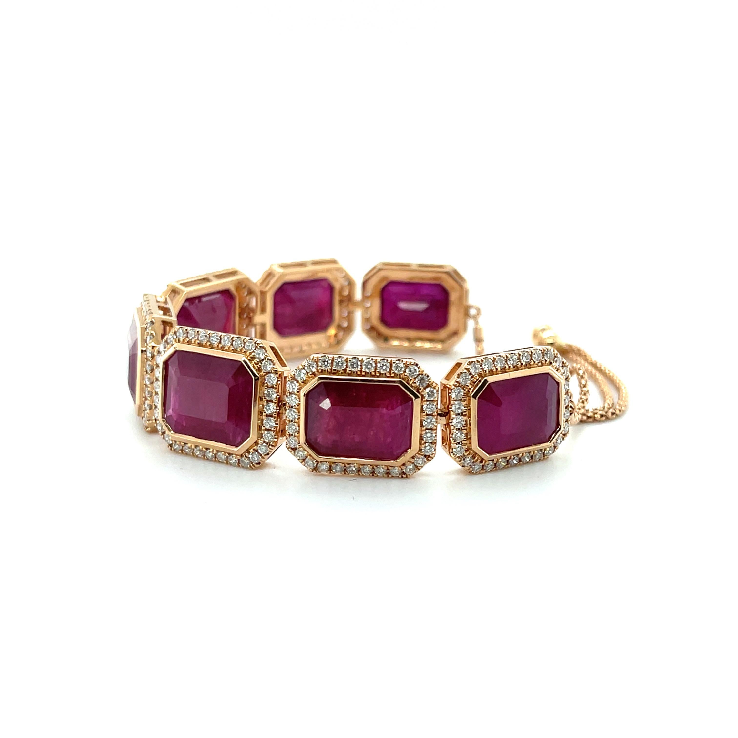 Natural ruby and diamonds, beautifully crafted in eighteen karat rose gold, complimented by a stunning polished finish design.

 One ladies - 18ct rose gold bracelet, polished finish, with safety chain. The item contains:
Seven rub over set emerald