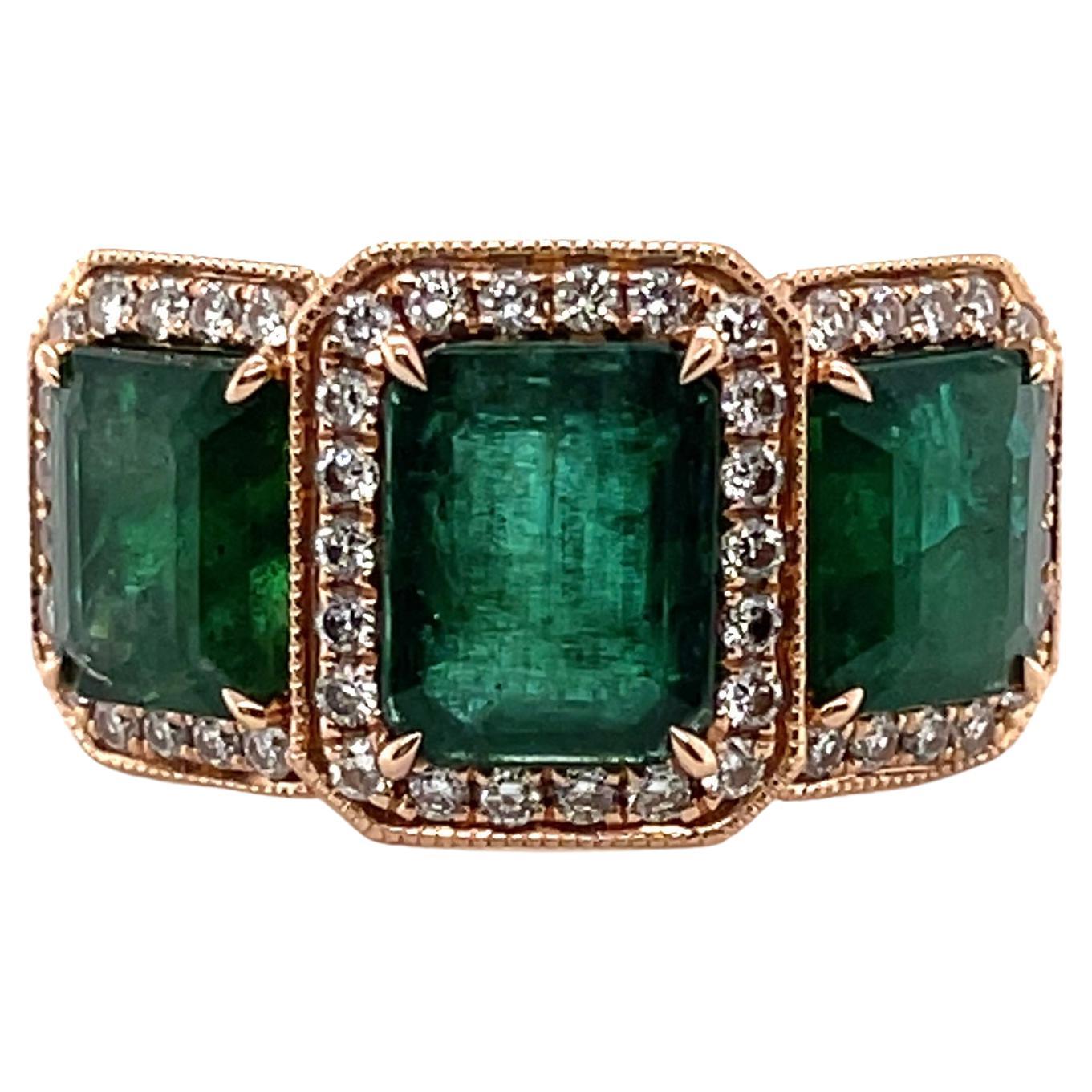 For Sale:  18ct Rose Gold Trilogy Emerald and Diamond Ring