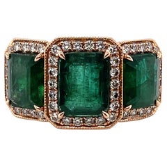18ct Rose Gold Trilogy Emerald and Diamond Ring