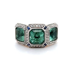 18ct Rose Gold Trilogy Emerald, Blue Sapphire and Diamond Ring