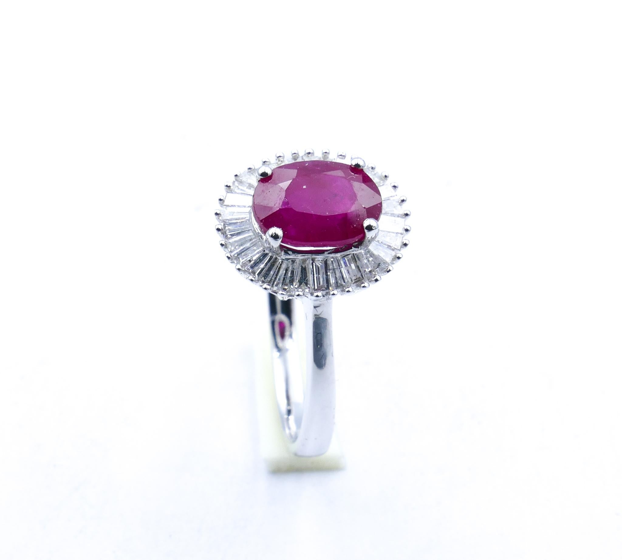 The smaller version of the classic Ballerina Style Ring is this lovely, vivid Ruby & Diamond Baguette Ring.
Great for a '40th' any occasion, Ruby being the stone for that Anniversary/Birthday.

Brand new, beautifully crafted in 18ct White Gold, the