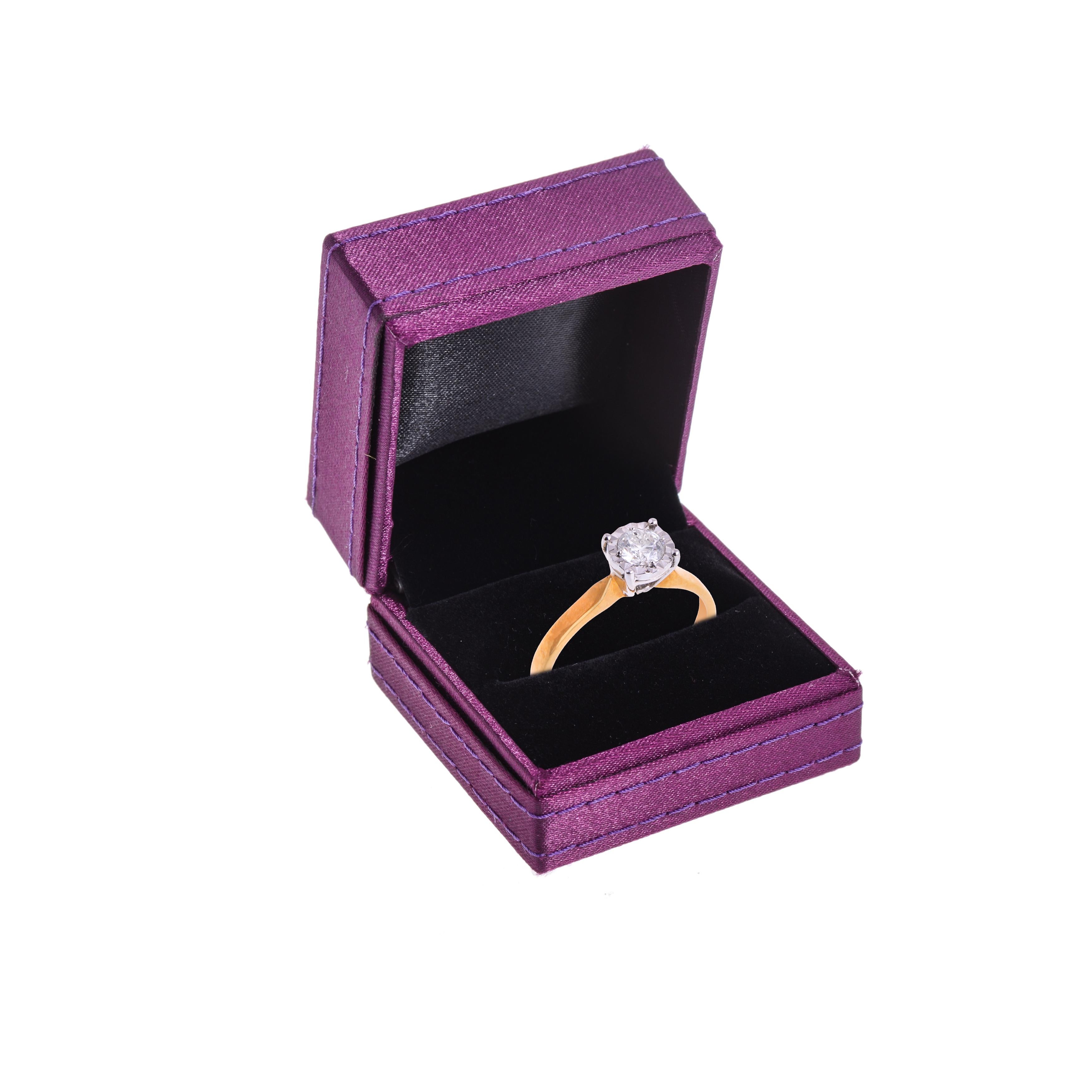 A solitaire ring in illusion setting set in 18ct yellow gold. perfectly suitable for anniversary or Christmas present to your lady.

Centre Diamond: 0.35ct

Colour, Clarity: H Si1

Metal Purity: 18ct Yellow Gold

British Hallmarked