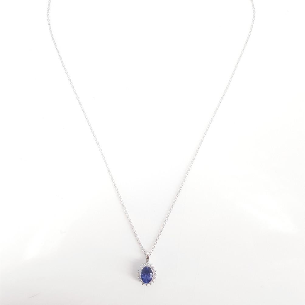 Oval Cut 18ct Tanzanite and Diamond Cluster Necklace For Sale
