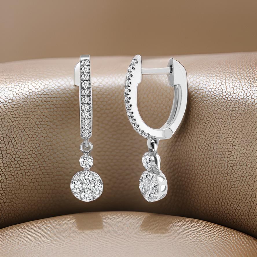 Description
18ct White 0.50ct Diamond Earrings

Details
Gram: 1.9

Metal Type: 18ct Gold

Metal Colour: White

Total Diamond Weight: 0.50ct

G 

SI

Width: 5mm

Height: 23mm

Total Stone Weight: 0.50ct

Please add your desired size in message when