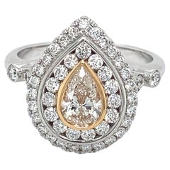 18ct White and Rose Gold Pear Cut 'certified' Diamond Dress Ring