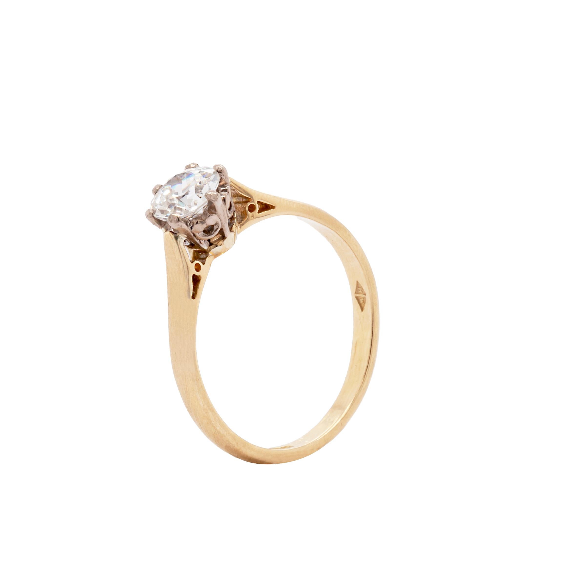 This is a gorgeous and timeless old mine cut single stone ring. The beautiful cushion-shaped diamond weighs a plentiful 0.79 carats and is set in a vintage 18ct yellow gold ring, finished with a white gold setting to perfectly complement the
