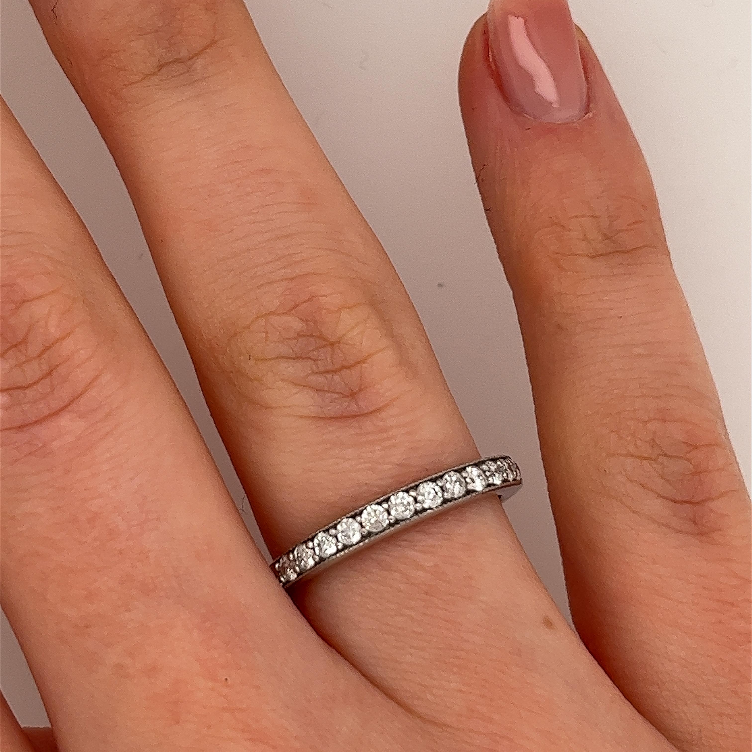 This 18ct white gold diamond half-eternity band is set with natural diamonds, with a total diamond weight of 0.36ct. This ring is elegant and beautiful.
Total Diamond Weight: 0.36ct 
Diamond Colour: H
Diamond Clarity: SI1
Width of Band: 2mm 
Width