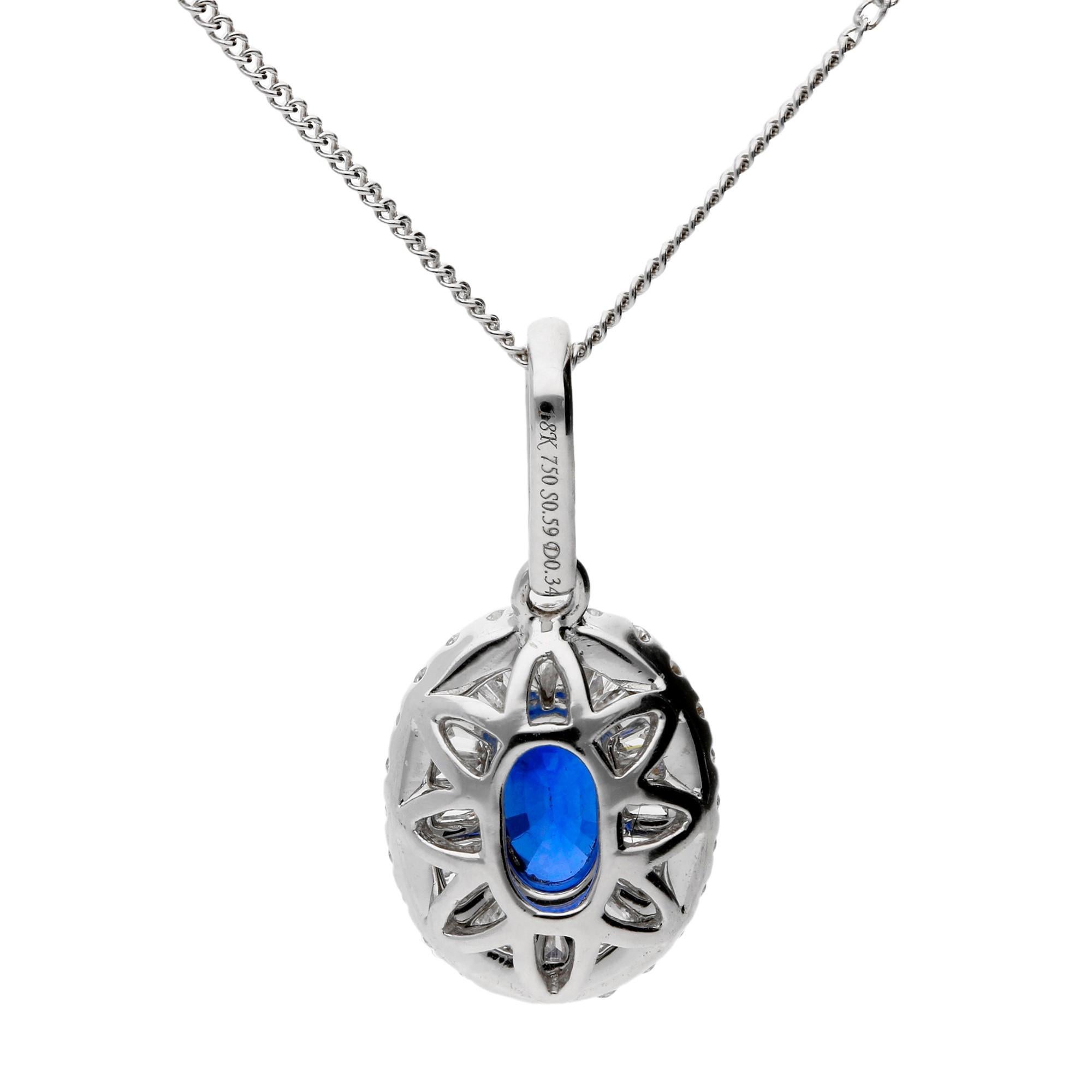 DESCRIPTION
A delightful white gold, sapphire and diamond oval cluster pendant.The sparkling opulence of the diamonds (0.34ct total) showcase this rich blue sapphire beautifully. A fabulous Deco inspired amulet of style and glamour with an