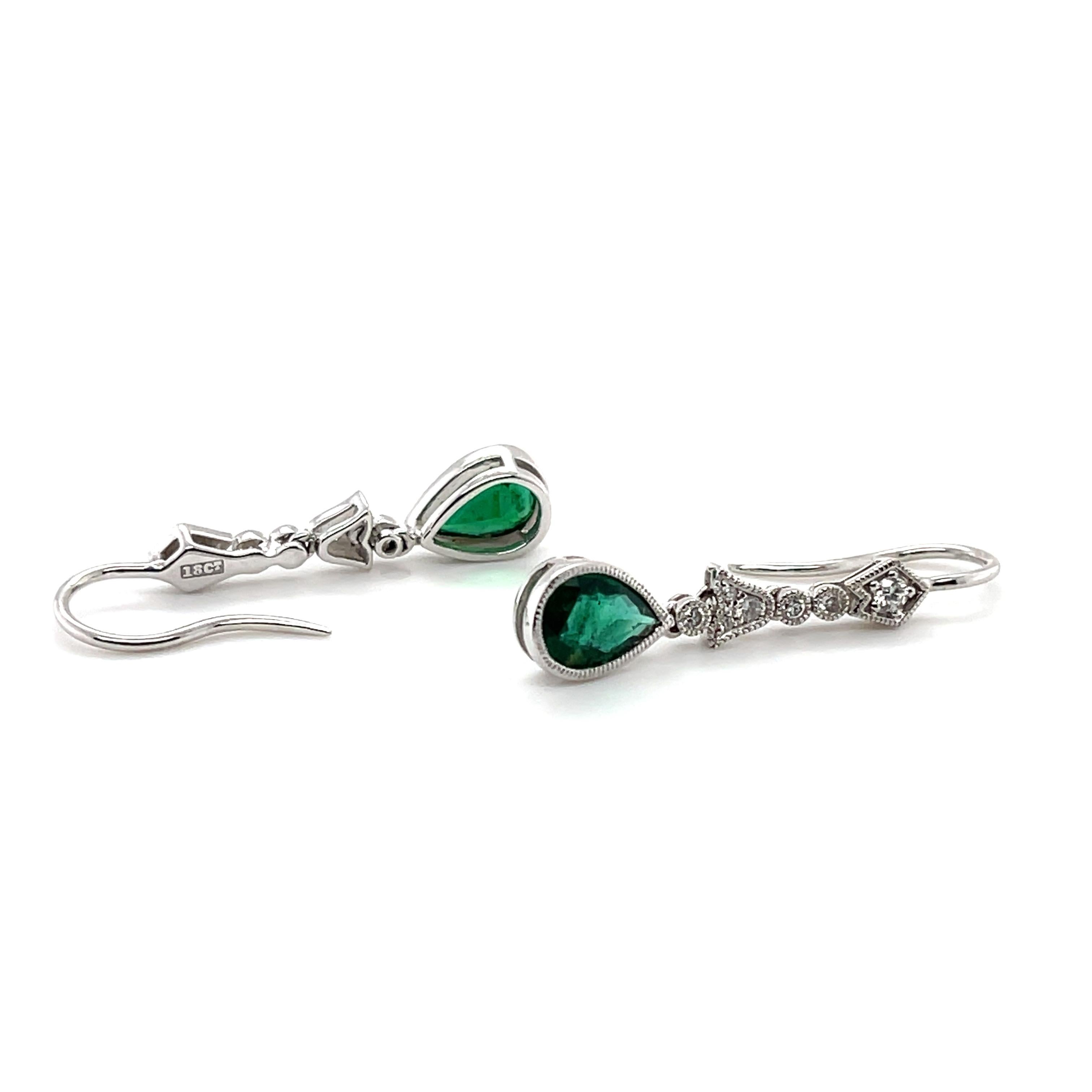 Pear Cut 18ct White Gold 0.66ct Emerald and Diamond Earrings For Sale