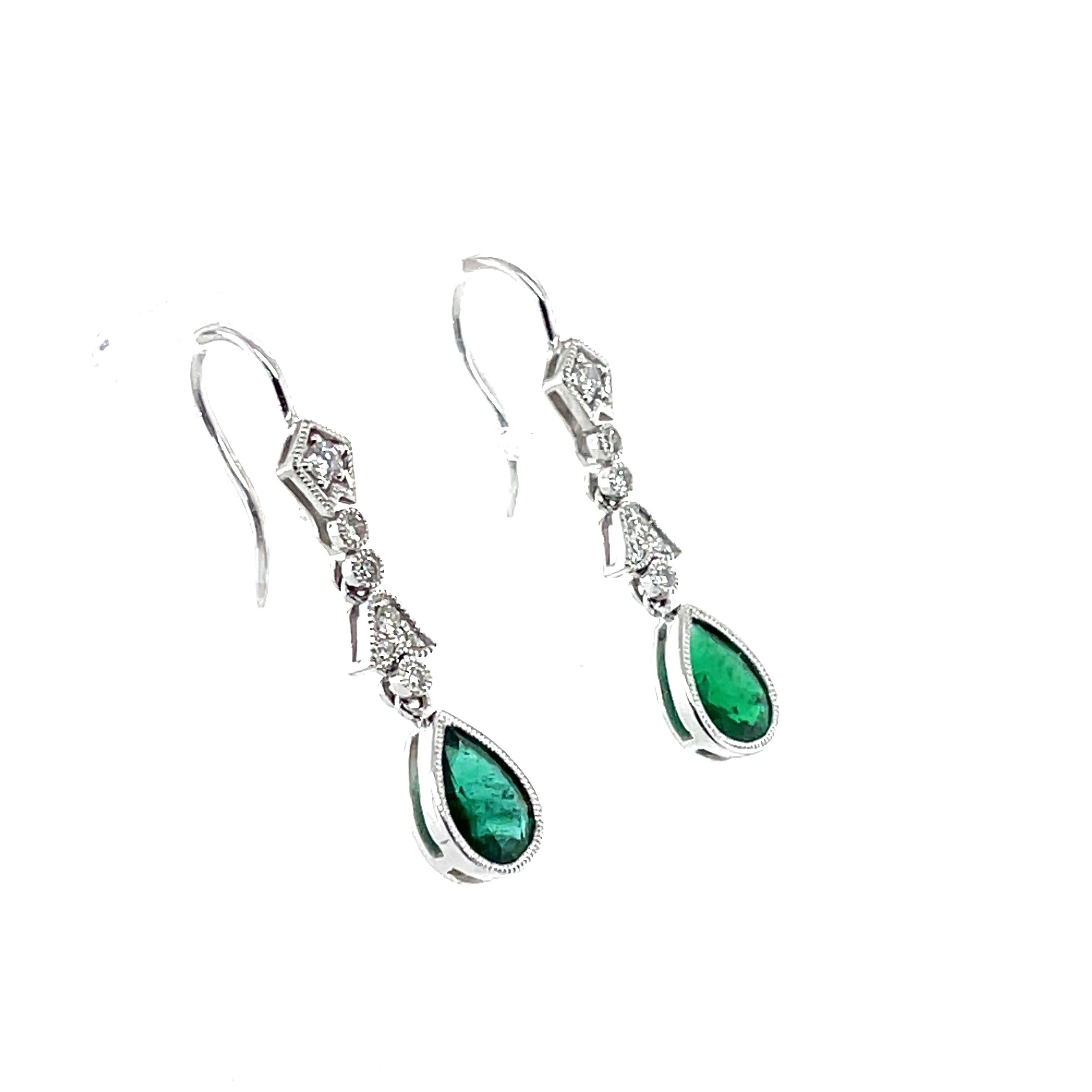 Contemporary 18ct White Gold 0.66ct Emerald and Diamond Earrings For Sale
