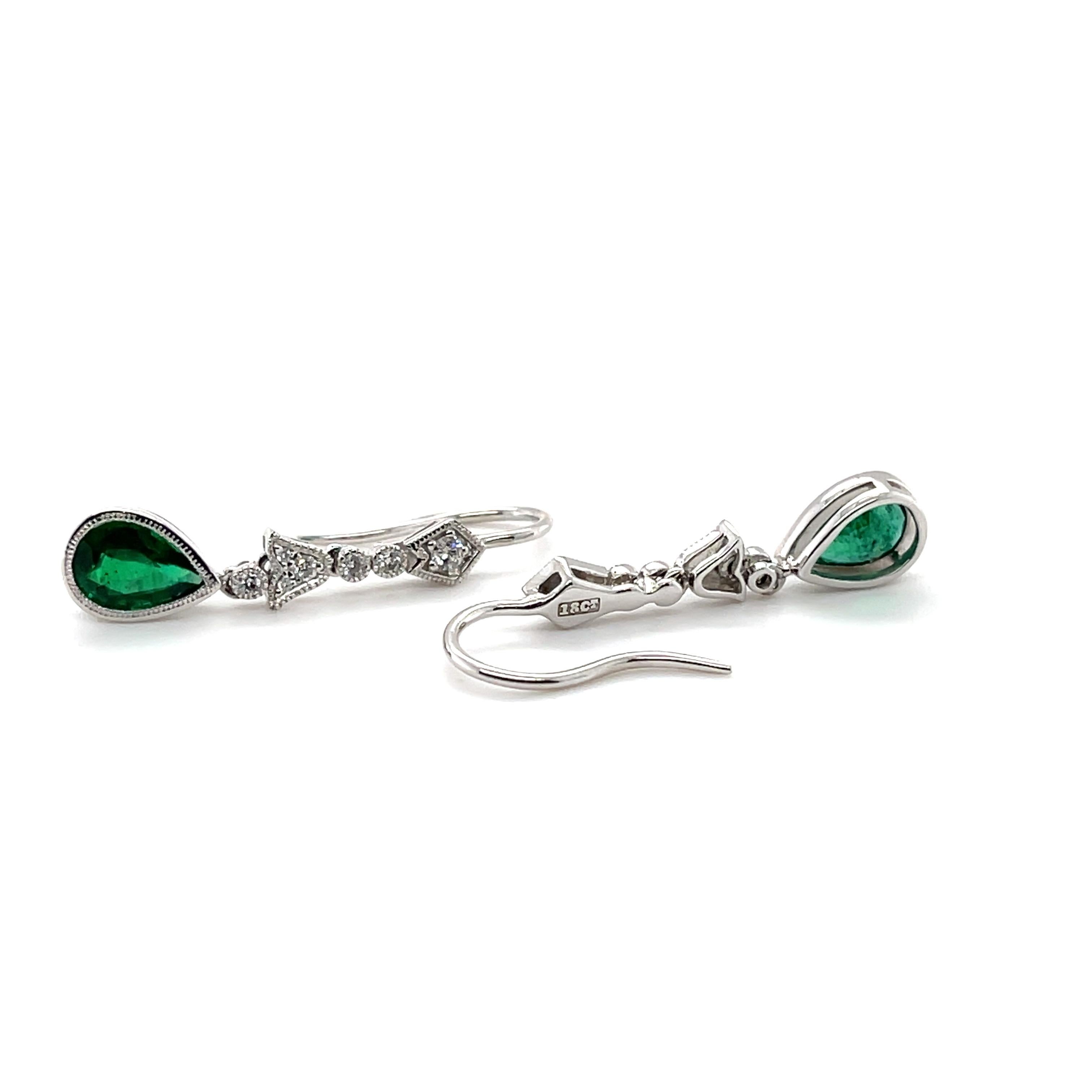 Women's 18ct White Gold 0.66ct Emerald and Diamond Earrings For Sale