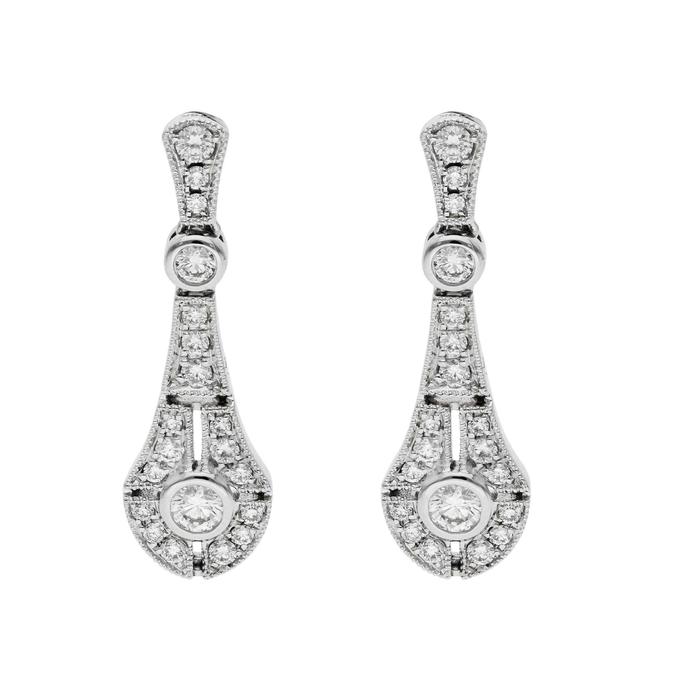 These majestic, ladies drop earrings are inspired by the roaring 1920's. An amazing and opulent pair of diamond drop earrings. The perfect gift for a diamond anniversary, April birthday or just because.

Each designed as a pear drop, diamond