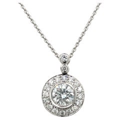18ct White Gold 0.80ct Diamond Halo Pendant Suspended from 16" Chain