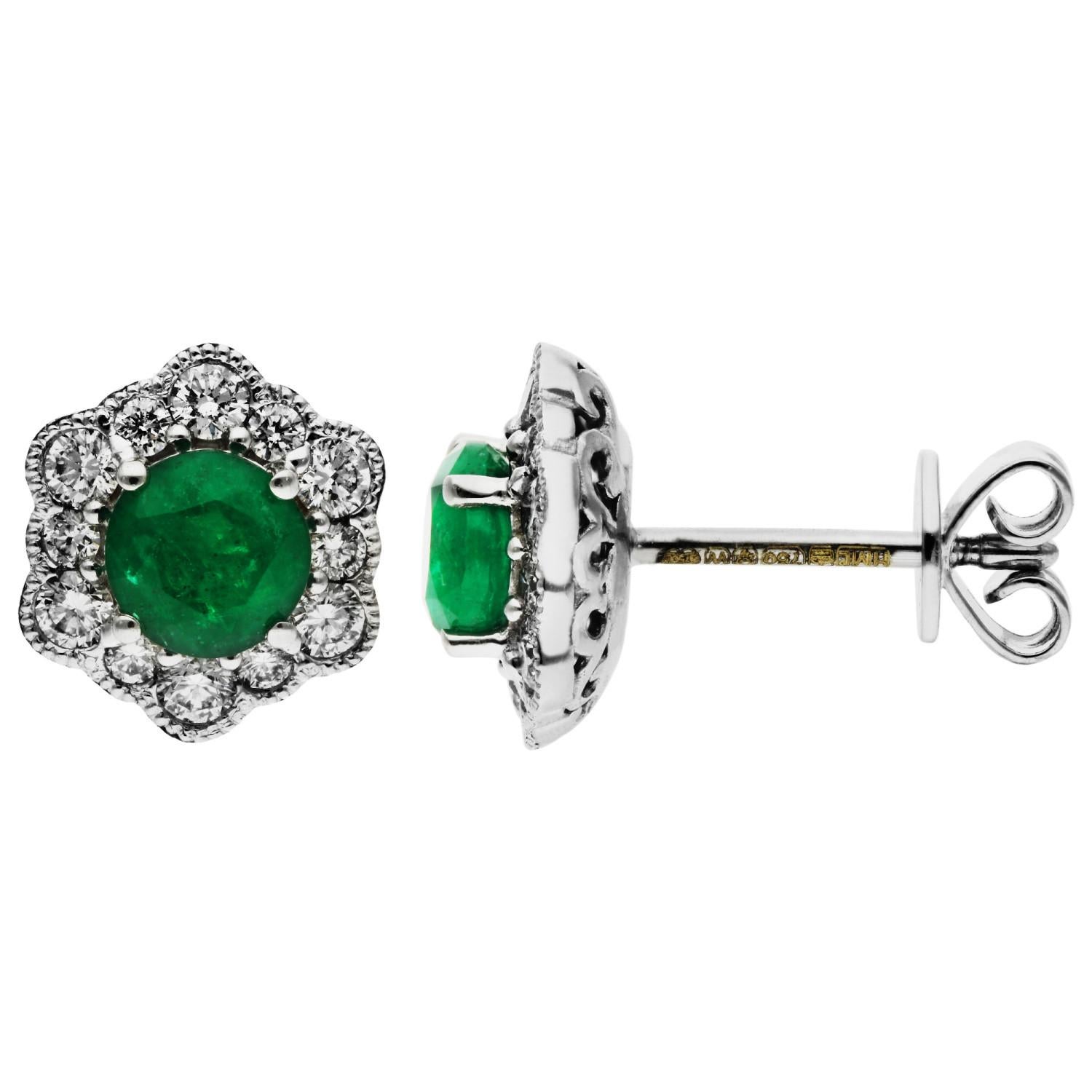 18ct White Gold 0.95ct Emerald & 0.49ct Diamond Flower Stud Earrings

Introducing our stunning 18ct White Gold Emerald & Diamond Flower Stud Earrings, a dazzling union of nature's splendour and exquisite craftsmanship. Each earring features a