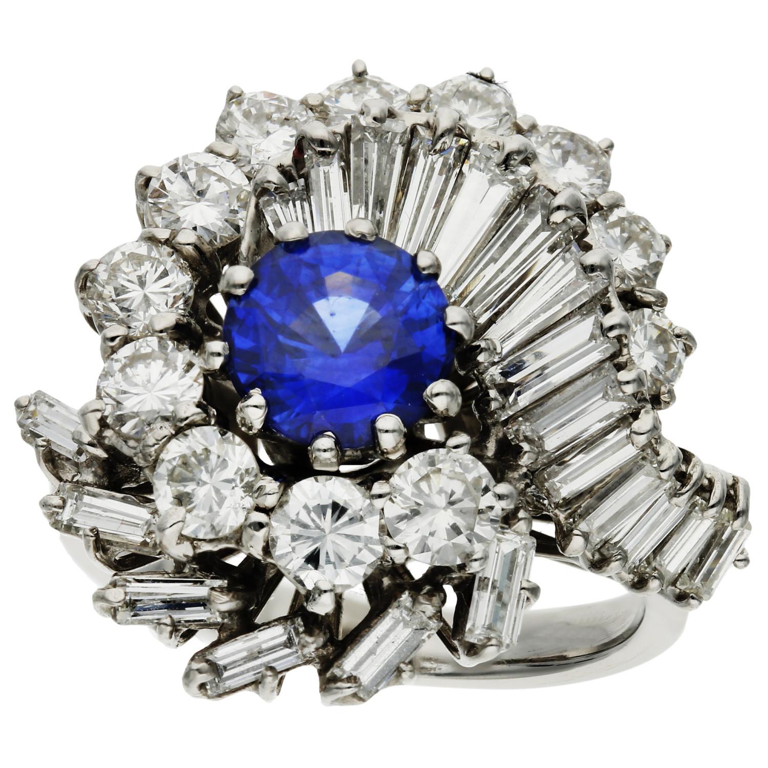 18ct White Gold 1.78ct Sapphire & 2.50ct Diamond Cocktail Ring 

Elevate your jewellery collection with this stunning Pre-Owned 18ct White Gold Sapphire & Diamond Ring, a symphony of elegance and sophistication. At its heart, a mesmerising round-cut