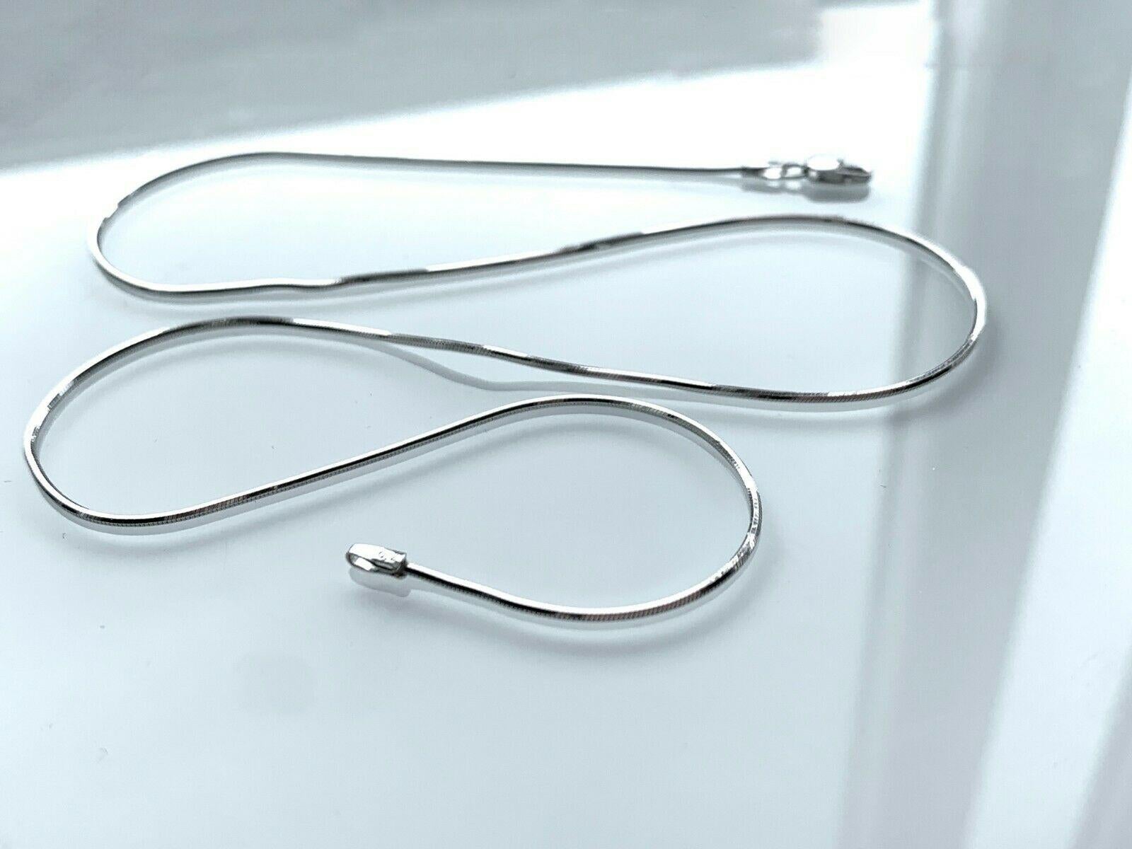 18ct 750 White Gold Necklace
Modern bright and shiny - smooth & slinky !
Thickness 1mm 
Length 18