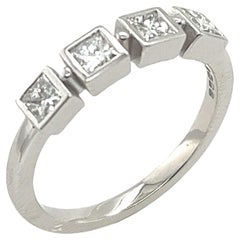 Bague en or blanc 18 carats à 4 pierres serties de 0,52 carats de diamants de taille Princesse  bijou