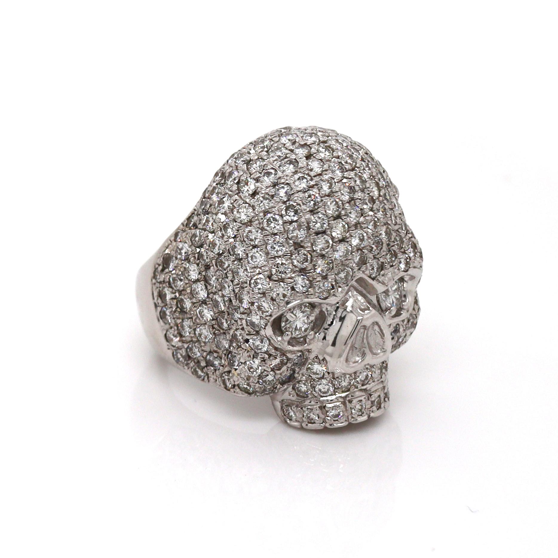 18ct White Gold 4.05ct Diamond Skull Ring

This bold diamond skull ring is crafted in 18ct white gold, exuding an edgy yet luxurious vibe. The skull itself is intricately detailed, with smooth, polished contours and subtle texture that give it a