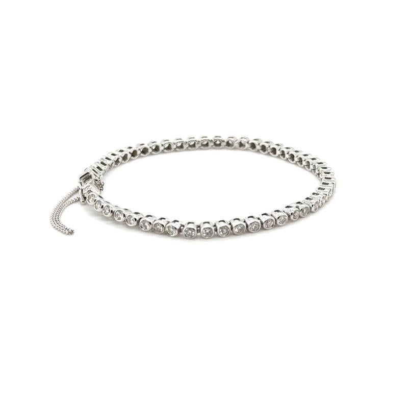 Contemporary 18ct White Gold Bezel Set Diamond Tennis Bracelet For Sale