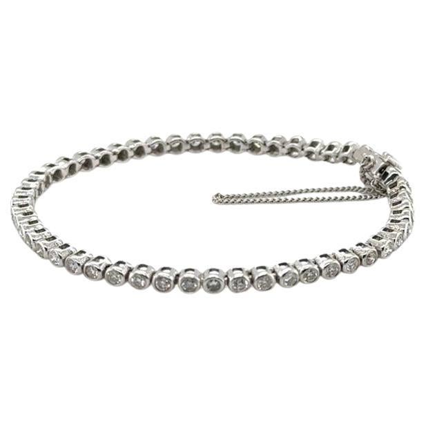 Bracciale da tennis con diamanti incastonati in oro bianco 18 ct.