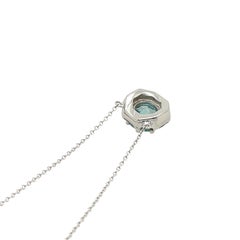 18ct White Gold Blue Topaz and Diamond Pendant