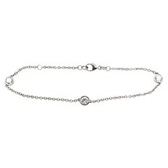 Bracciale in oro bianco 18 ct con 3 diamanti tondi e brillanti