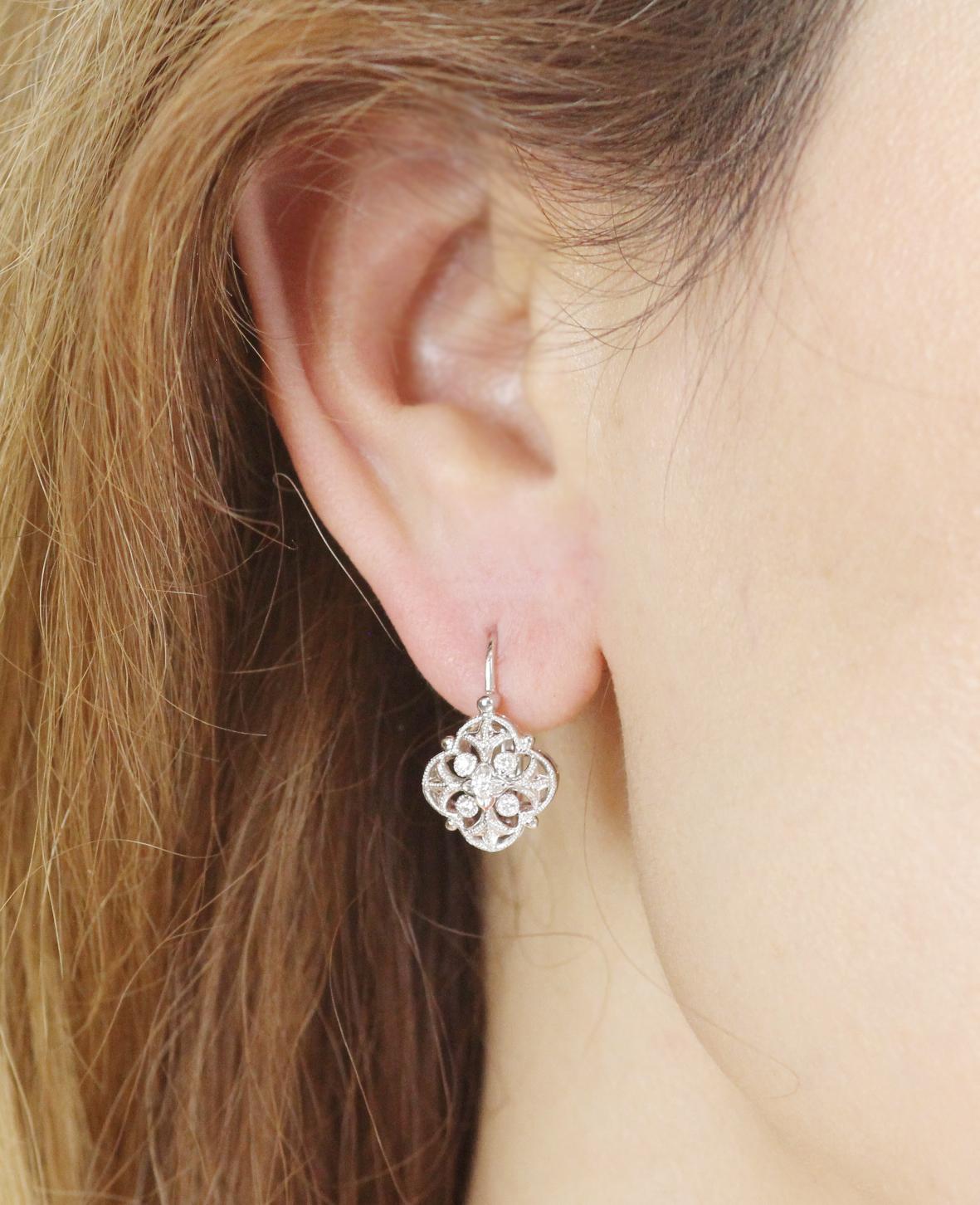 Featuring a decorative quatrefoil frame set with glittering round brilliant diamonds, these earrings are perfect for the office and then into cocktail hour!

With a total diamond weight of 0.16ct, these pretty, shimmery earrings will be a fashion