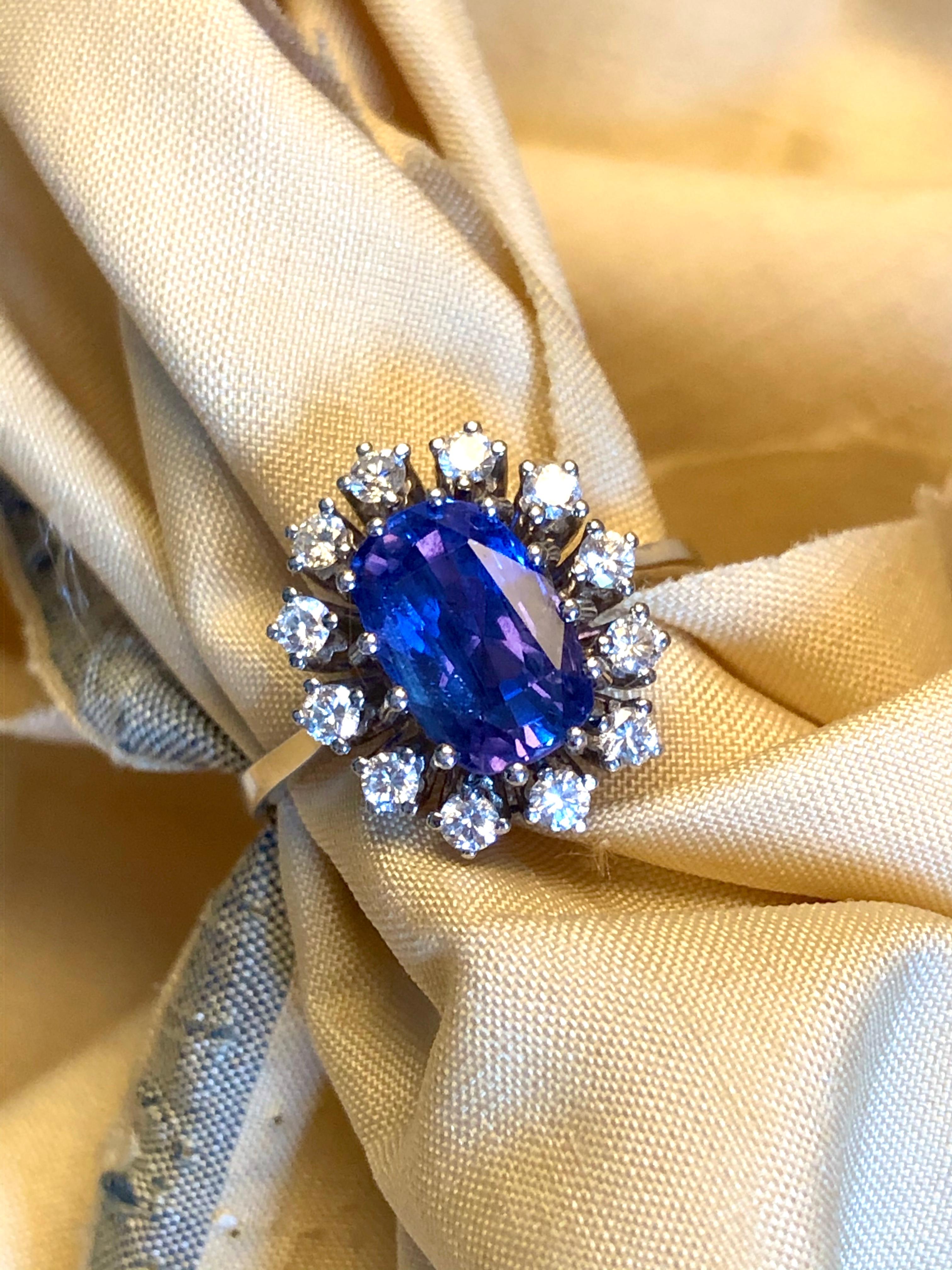 Colour-change sapphire and diamond ring, 20th century. This unheated Sri Lankan sapphire appears a striking blue in daylight, and a vivid violet in incandescent light. The reason for this unusual phenomenon is the presence of Chromium in the stone,