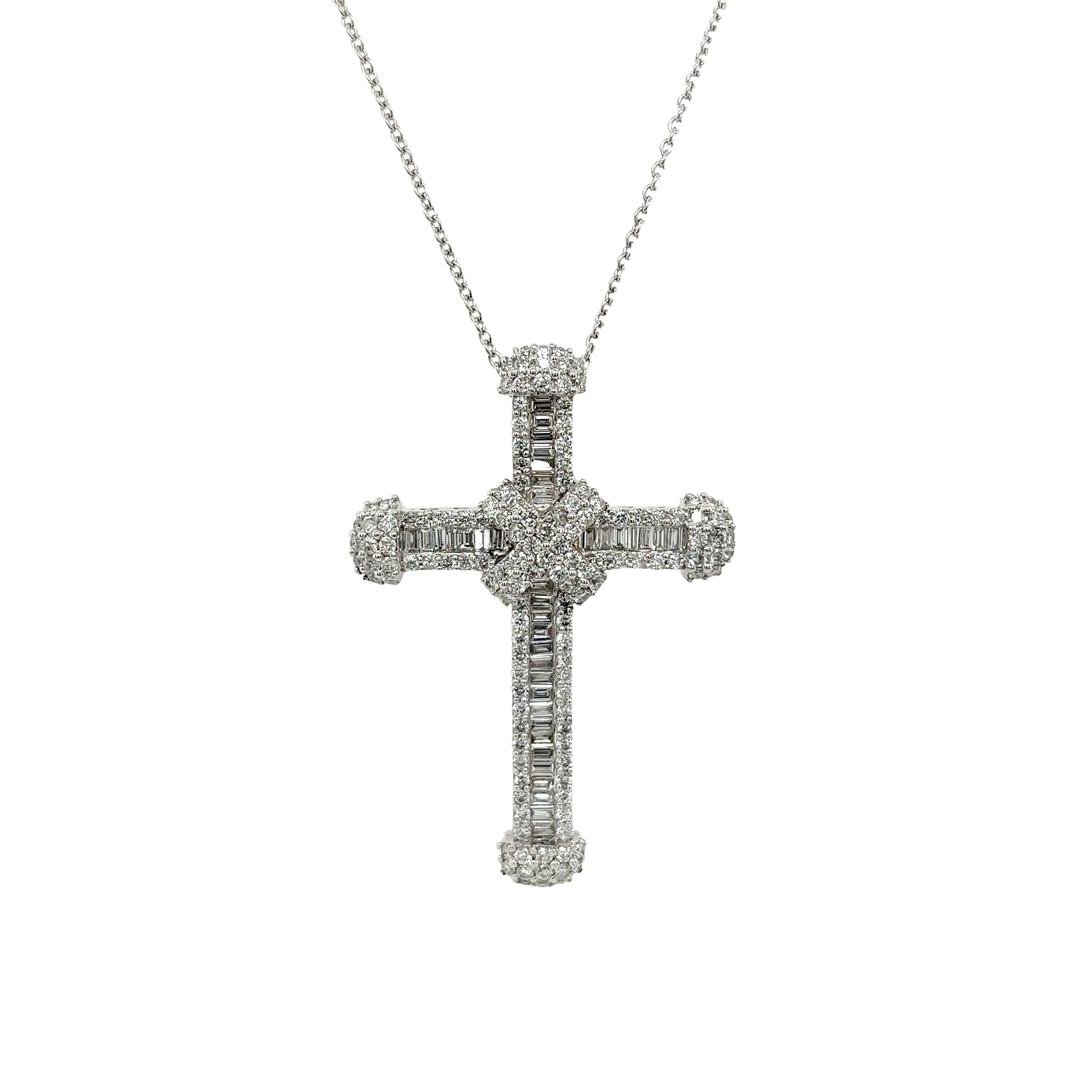 This cross pendant is set with 1.50ct natural round brilliant cut and 1.0ct baguette diamonds G colour & VS1 clarity in a beautiful setting. In 18ct white gold, and total length of the necklace is 18 inches. 

Total Diamond Weight: 2.50ct
Diamond