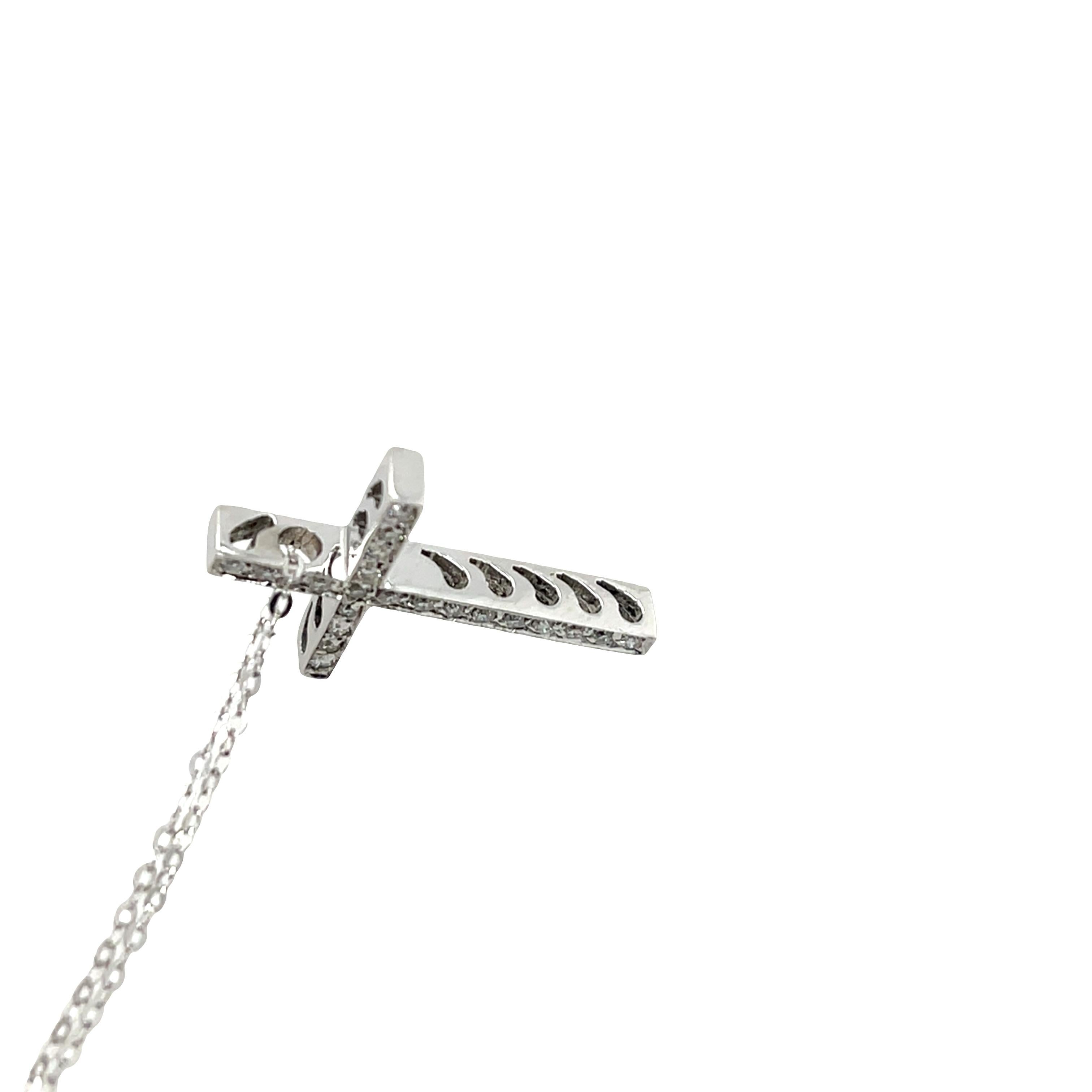 Elegant and timeless 18ct white gold cross pendant, 
set with 0.20ct round diamonds,
paired with a matching 18-inch 18ct white gold chain. 
Perfect for everyday wear or as a thoughtful gift for a special occasion.
Total Weight: 2.22g
Cross Size: