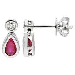 Orecchini in oro bianco 18ct con diamanti e rubini da 0,45ct