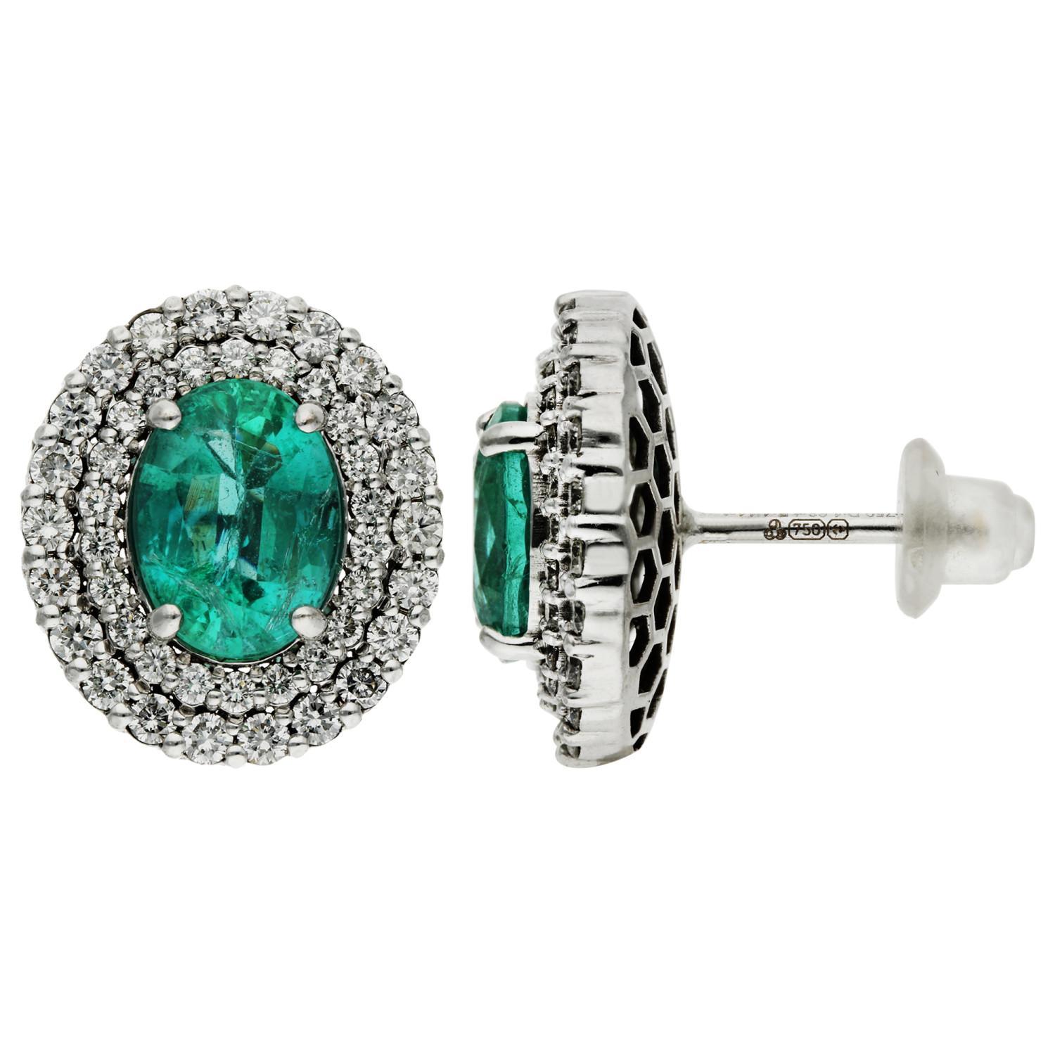 18ct White Gold Diamond & 4.14ct Emerald Earrings

Experience the allure of our Pre-owned 18ct White Gold Diamond & Emerald Earrings, a truly exquisite addition to any fine jewellery collection. Centrally featured in each earring is a vibrant
