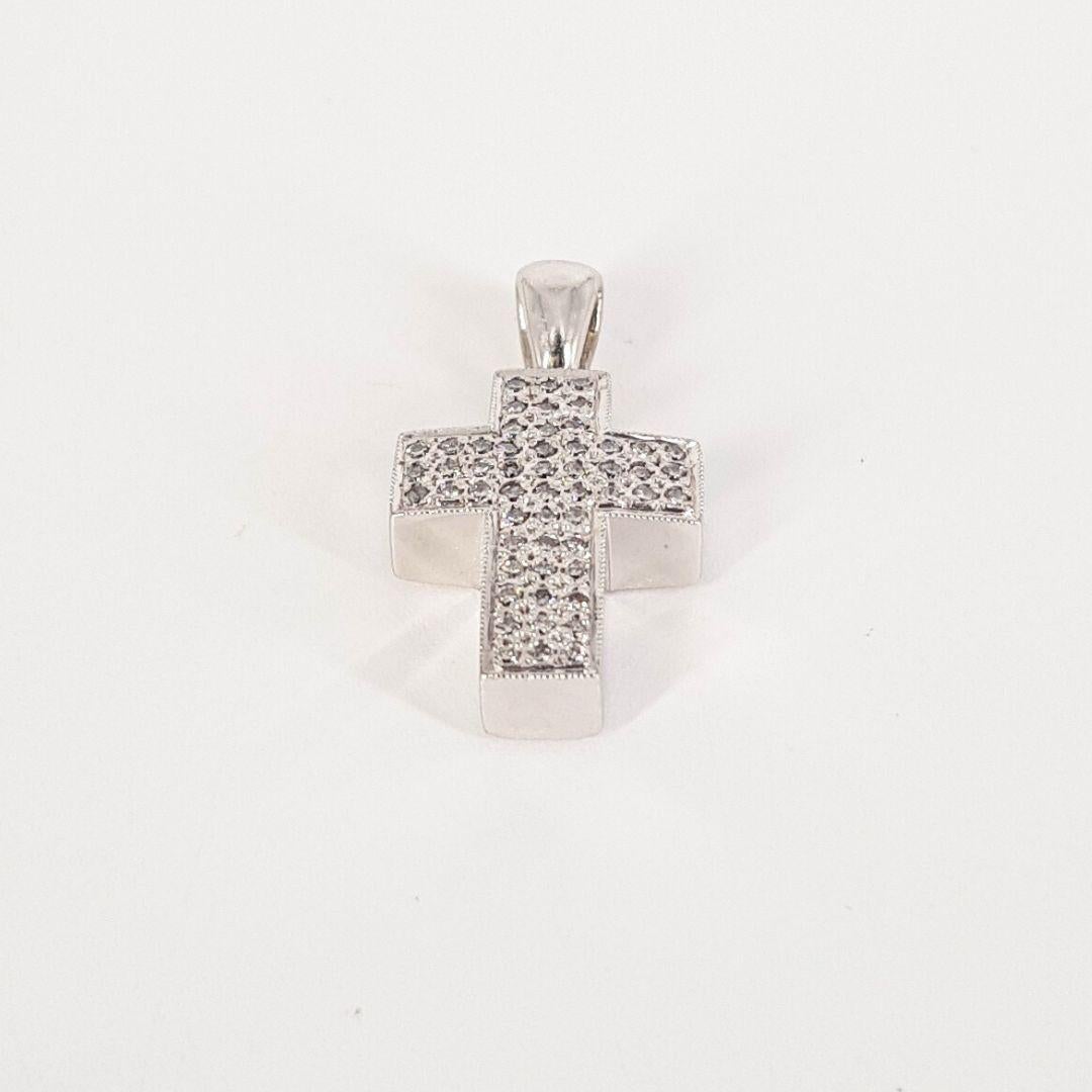 Item Attributes:
Metal Colour:		White Gold
Length:                               26mm
Width:                                 14mm  
Weight:                               7.2g
Stone Attributes
Number of stones:	54 x Diamond
Carat Weight:		54 x