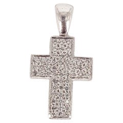 Pendentif croix en or blanc 18 carats et diamant