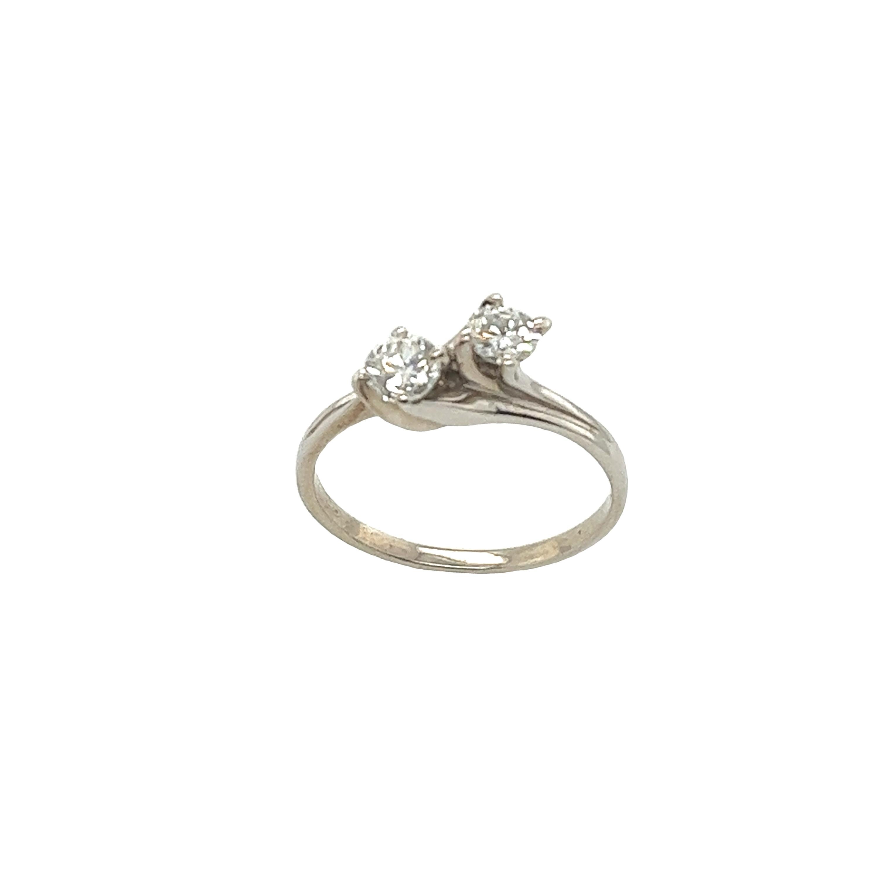 This preloved classic 2 stone crossover ring with total diamond weight 0.50ct G/SI1. A timeless symbol of everlasting love.
Total Diamond Weight: 0.50ct
Diamond Colour: H
Diamond Clarity: SI1
Width of Band: 1.60mm
Width of Head: 5.50mm
Length of